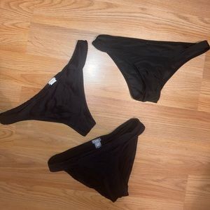Black bikini tops and bottoms
